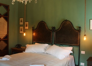 Double antique headboard in wrought iron