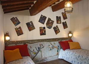 Hand painted animal decorations on the restored antique headboard