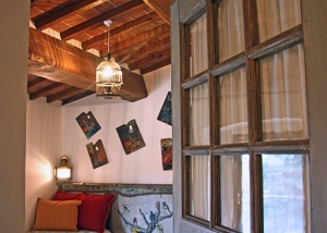 Double room with stylish furnishings and exposed beams