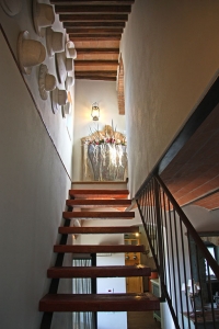 Precious details and exterior views of exclusive villa in Chianti