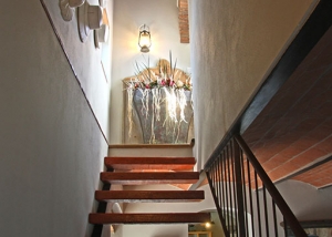 Precious details and exterior views of exclusive villa in Chianti